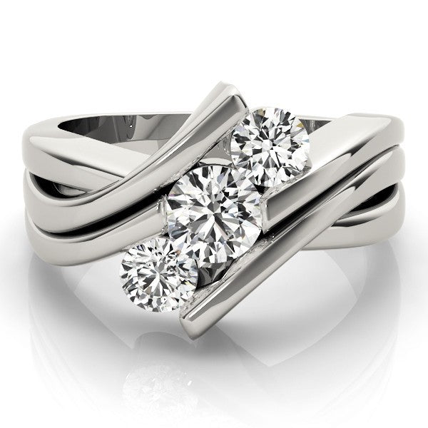 Silver ring with three diamonds on a white background