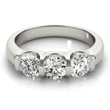 Silver ring with three diamonds on a white background