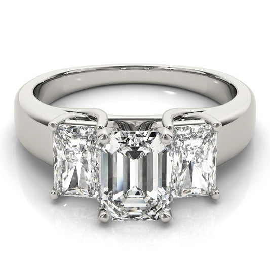 Diamond ring with three rectangular-cut diamonds on a white background