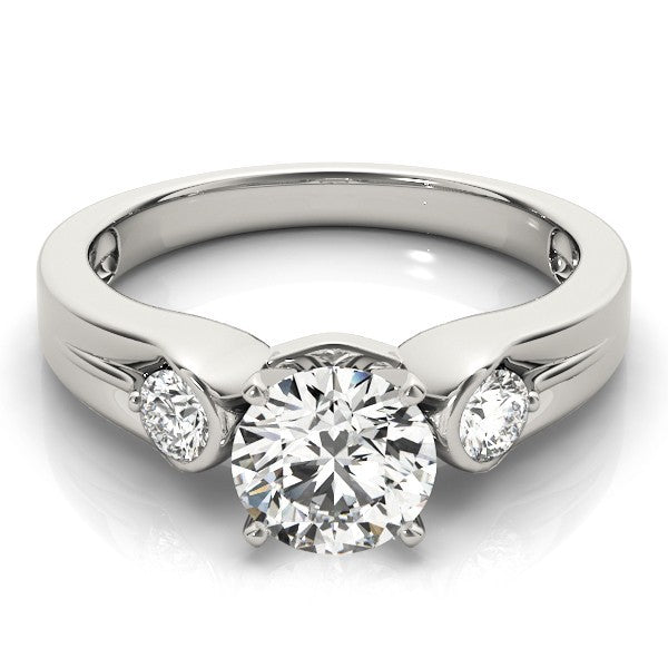 Silver ring with a central diamond and two smaller diamonds on a white background