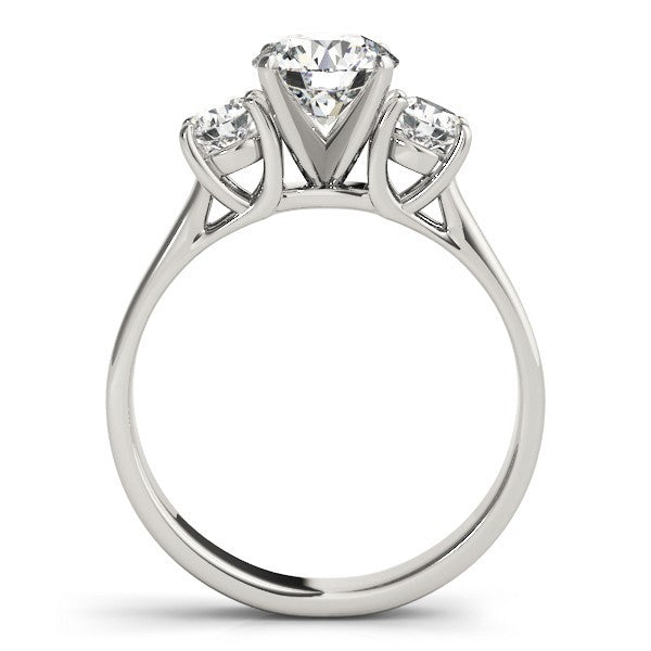Diamond ring with three clear gemstones on a white background