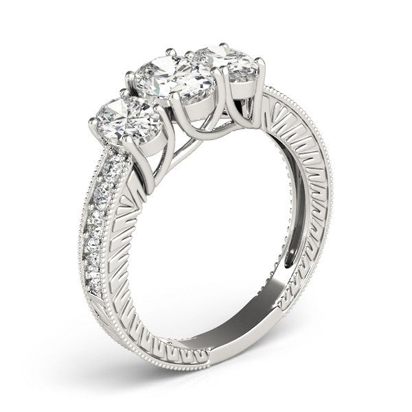 Silver ring with three diamonds on a white background