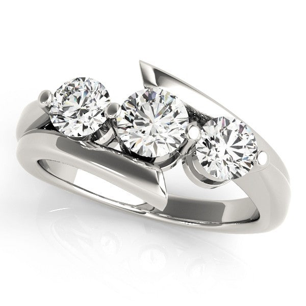 Silver ring with three diamonds on a white background