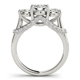 Silver ring with diamond accents on a white background