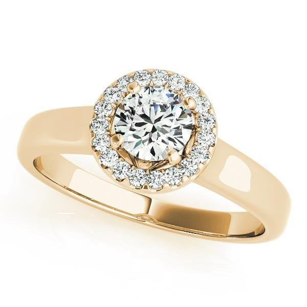 Round-cut diamond halo engagement ring in yellow gold with pave side diamonds.