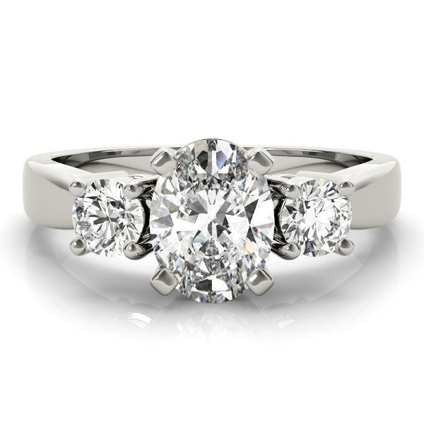 Diamond ring with three round diamonds on a white background