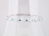 Oval Lab-Grown White Opal Line Bracelet In Gold & Platinum