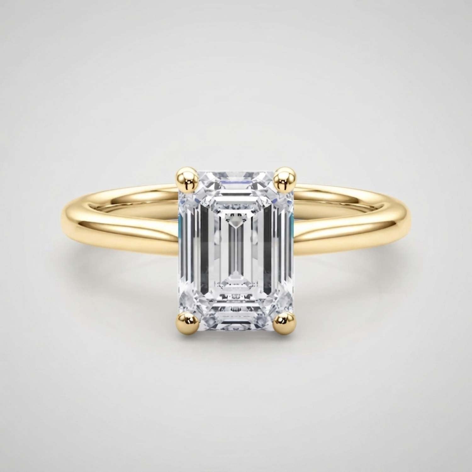 Delicate 0.50Ct emerald-cut lab diamond solitaire ring designed for a minimalist everyday look.