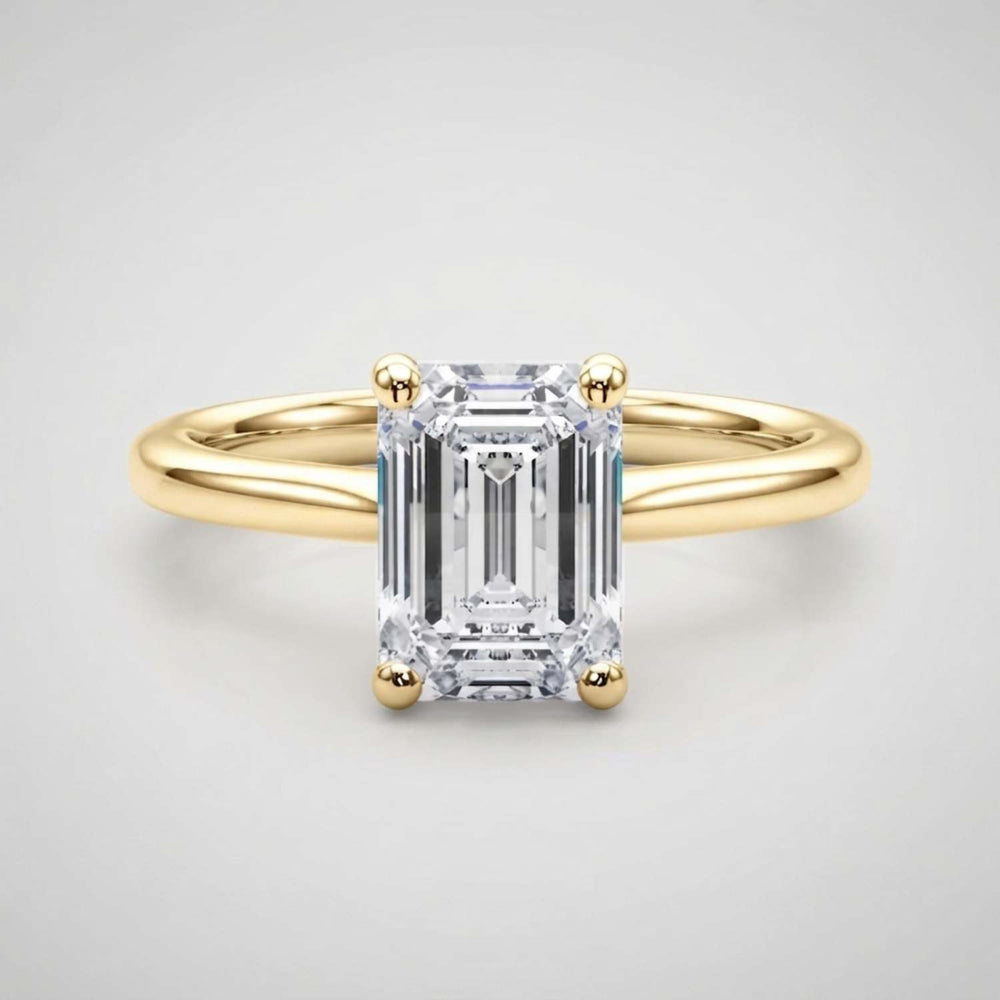 Delicate 0.50Ct emerald-cut lab diamond solitaire ring designed for a minimalist everyday look.
