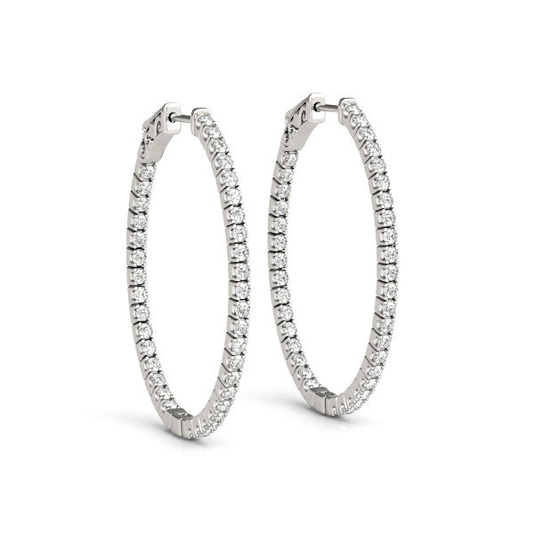 Diamond hoop earrings on a white background