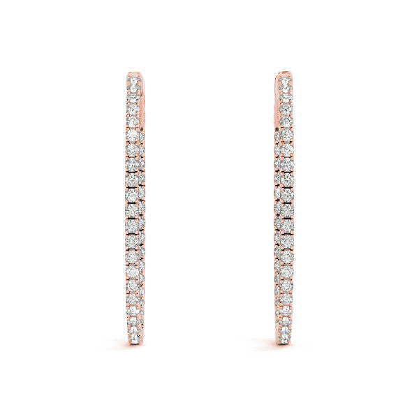 Rose gold hoop earrings with clear gemstones on a white background