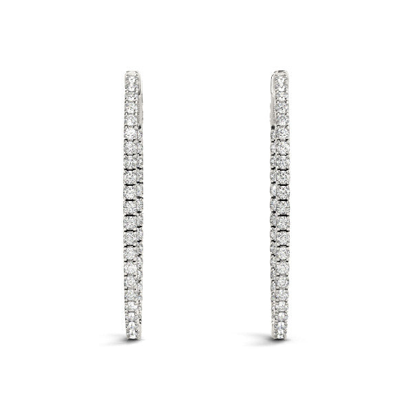 Pair of diamond hoop earrings on a white background