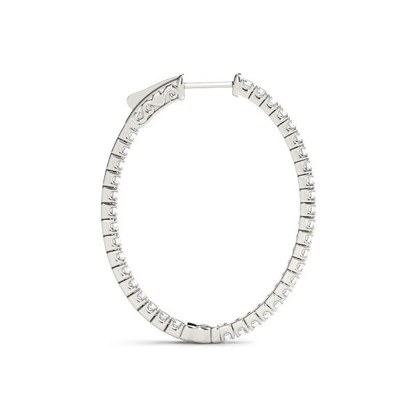 Silver hoop earring with small diamonds on a white background