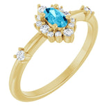 Oval Aquamarine Halo Ring with Diamond Accents in Yellow Gold