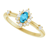 Oval Aquamarine Halo Ring with Diamond Accents in Yellow Gold