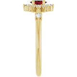 Oval Mozambique Garnet & Diamond Halo Ring in Yellow Gold