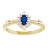 Oval Blue Sapphire Halo Ring with Diamond Accents in Yellow Gold