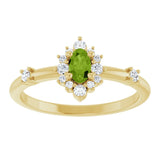 Oval Peridot Halo Ring with Diamond Accents in Yellow Gold