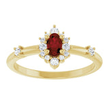 Oval Mozambique Garnet & Diamond Halo Ring in Yellow Gold