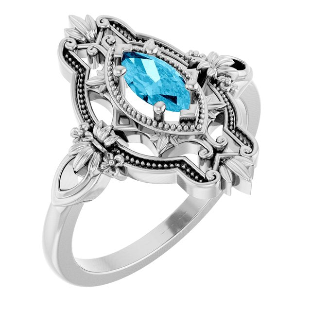 Marquise Aquamarine Solitaire Ring in Gold and Platinum