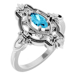 Marquise Aquamarine Solitaire Ring in Gold and Platinum
