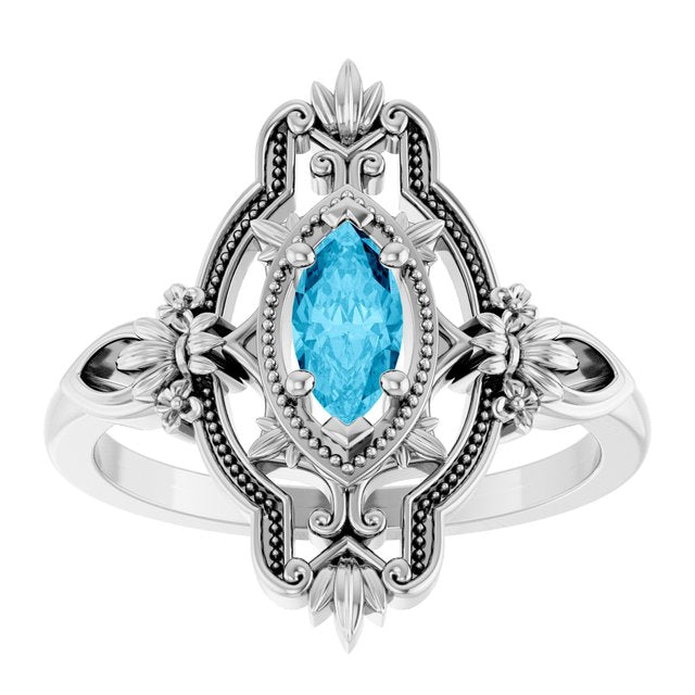 Marquise Aquamarine Solitaire Ring in Gold and Platinum