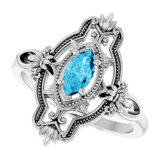 Marquise Aquamarine Solitaire Ring in Gold and Platinum