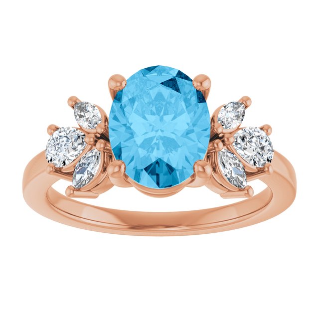 Oval Swiss Blue Topaz & Diamond Accented Ring in Gold and Platinum