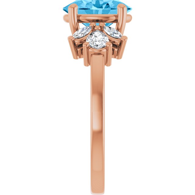 Oval Swiss Blue Topaz & Diamond Accented Ring in Gold and Platinum