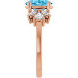 Oval Swiss Blue Topaz & Diamond Accented Ring in Gold and Platinum