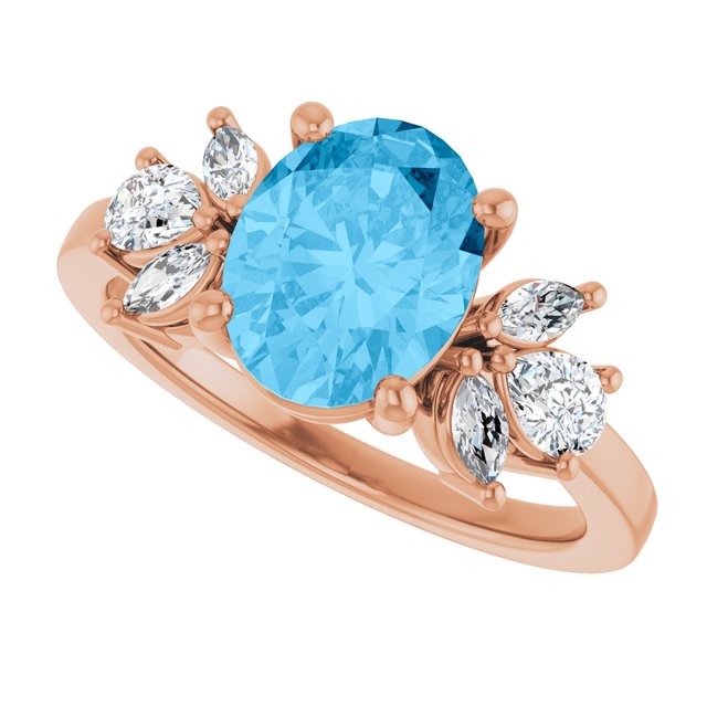 Oval Swiss Blue Topaz & Diamond Accented Ring in Gold and Platinum