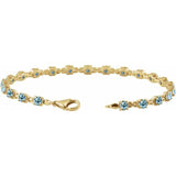 Round Natural Sky Blue Topaz Line Bracelet In Gold & Platinum