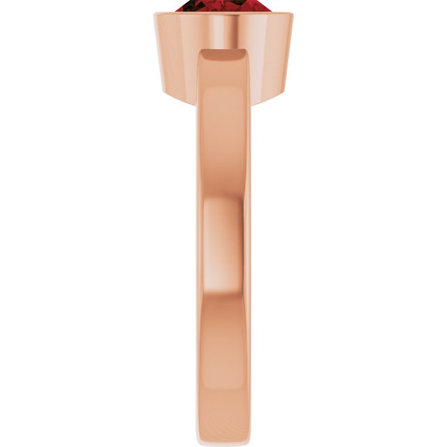 Oval Mozambique Garnet Solitaire Ring in Gold and Platinum