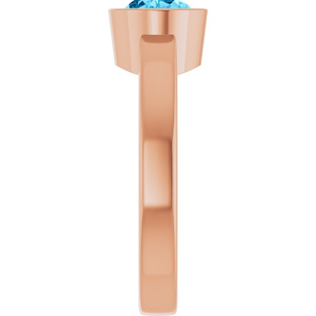 Oval Aquamarine Solitaire Ring in Gold and Platinum