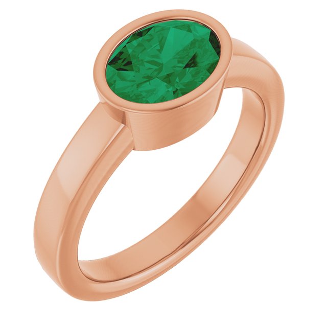 Oval Lab-Grown Emerald Solitaire Ring in Gold and Platinum
