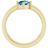 Oval Blue Zircon Solitaire Ring in Yellow Gold