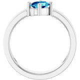 Oval Blue Zircon Solitaire Ring in White Gold