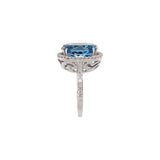 Oval Swiss Blue Topaz Halo Ring with Diamond Accents in White Gold