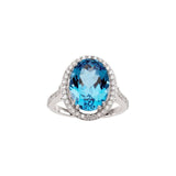 Oval Swiss Blue Topaz Halo Ring with Diamond Accents in White Gold