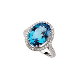 Oval Swiss Blue Topaz Halo Ring with Diamond Accents in White Gold