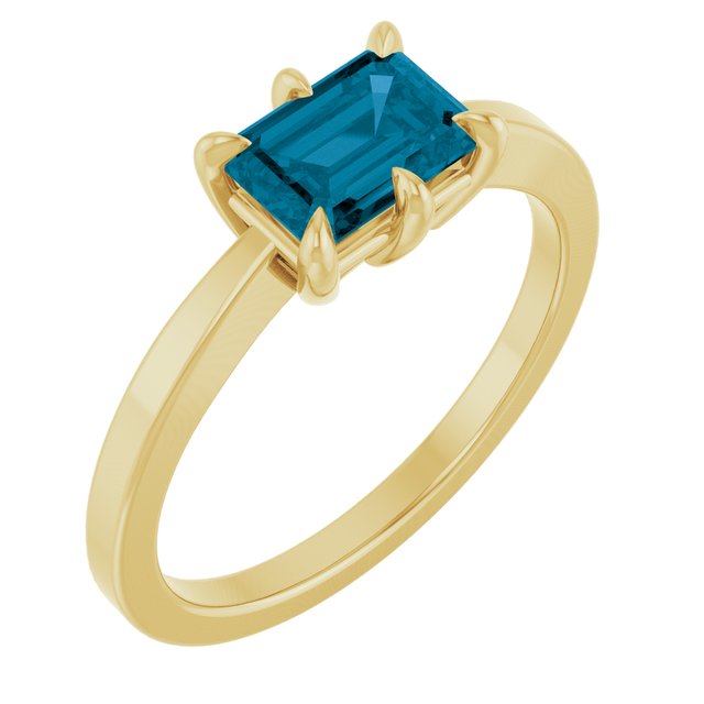 Emerald London Blue Topaz Solitaire Ring in Yellow Gold
