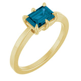 Emerald London Blue Topaz Solitaire Ring in Yellow Gold