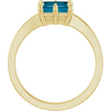 Emerald London Blue Topaz Solitaire Ring in Yellow Gold
