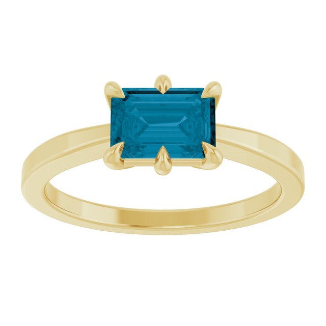 Emerald London Blue Topaz Solitaire Ring in Yellow Gold