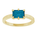 Emerald London Blue Topaz Solitaire Ring in Yellow Gold