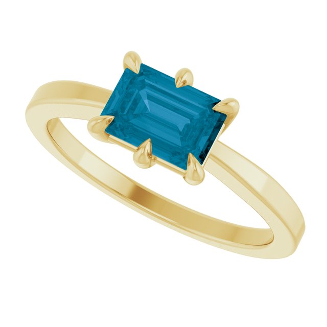 Emerald London Blue Topaz Solitaire Ring in Yellow Gold