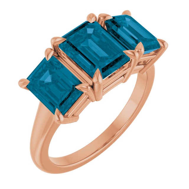 Emerald London Blue Topaz Three Stone Ring in Gold and Platinum