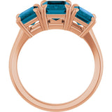 Emerald London Blue Topaz Three Stone Ring in Gold and Platinum