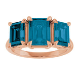 Emerald London Blue Topaz Three Stone Ring in Gold and Platinum