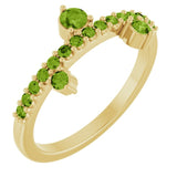 Round Peridot Accented Ring in Gold